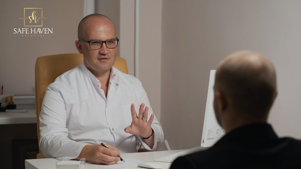 Doctor talking to his patient