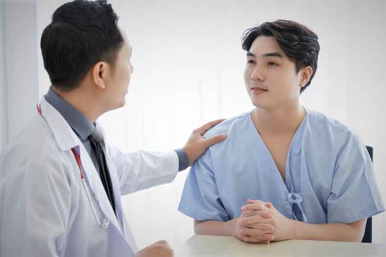 A doctor explaining something to his patient