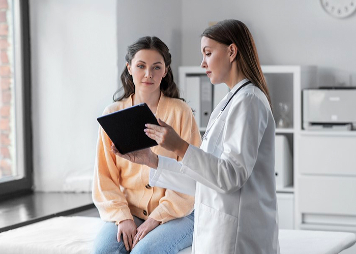 Therapist showing results to her patient