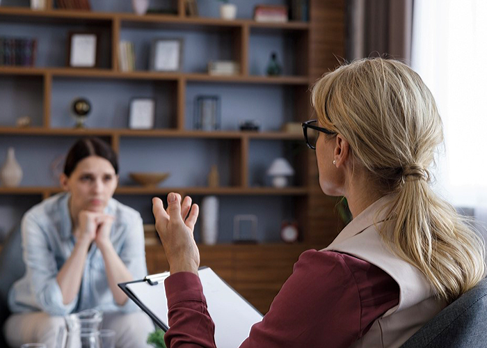 Patient listening attentively to her therapist