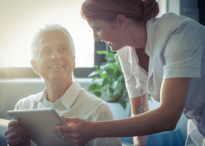 senior being happy with her therapist