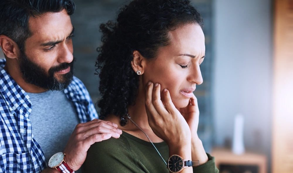 Shot of a man comforting his distraught wife