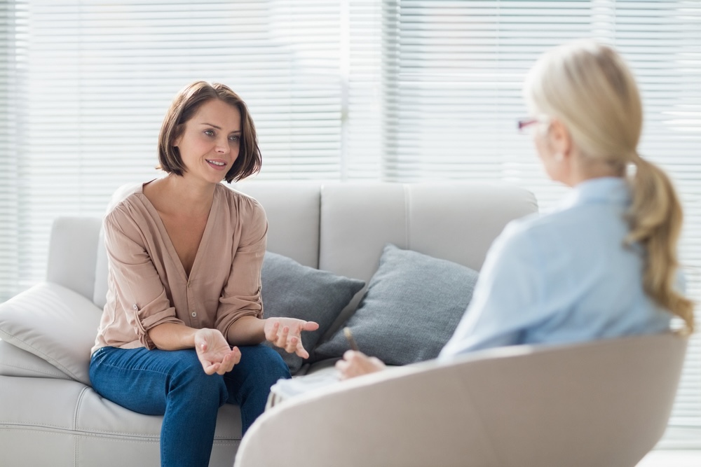 Woman talking to her therapist