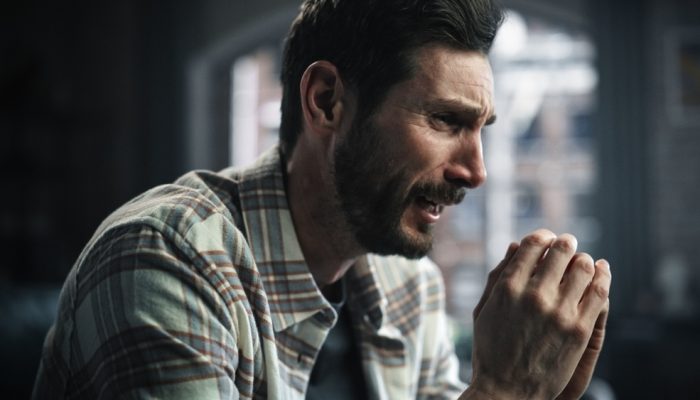 An emotional man with mental health problems